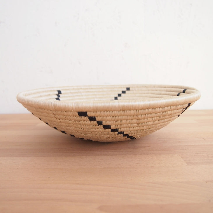 Shop Stacy Garcia_Accessories_Bowls_Beige and Black Pinwheel Woven Bowl_Side view